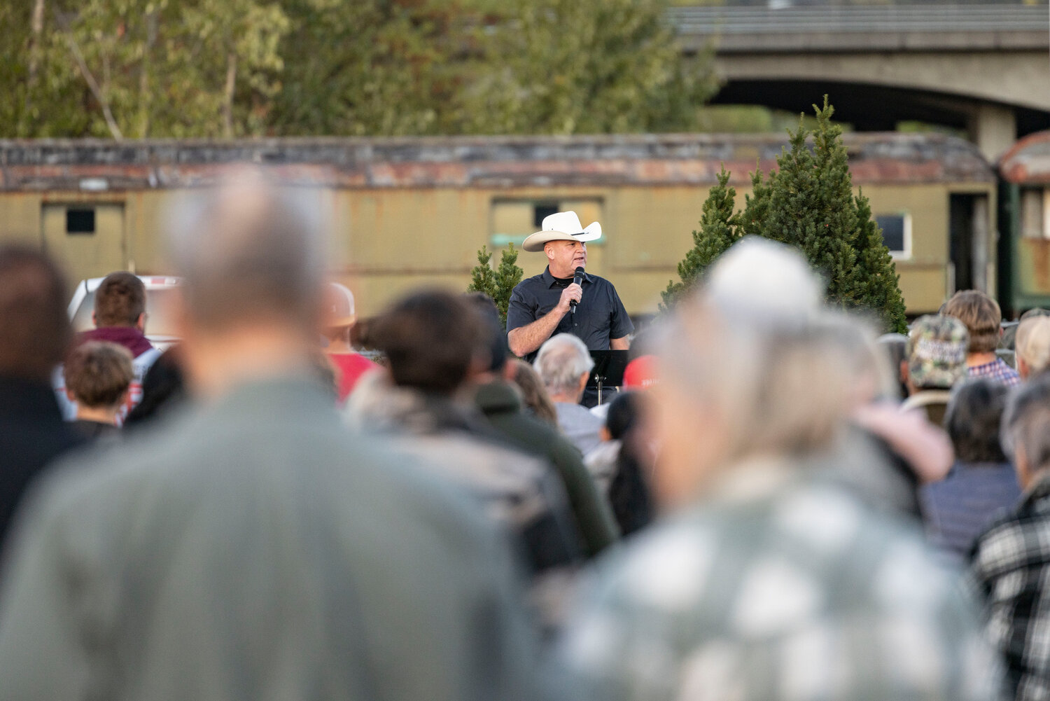Scott Brummer addressing a crowd at an outdoor rally